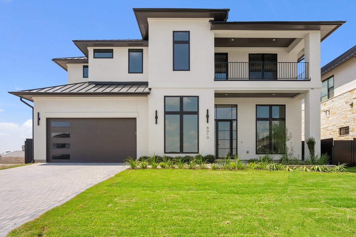 View 6010 Adhara PASS in River Place, Milky Way at River Place 6010 Adhara PASS - front exterior with modern two-story facade - Luxury home in River Place, Milky Way at River Place, Aus...