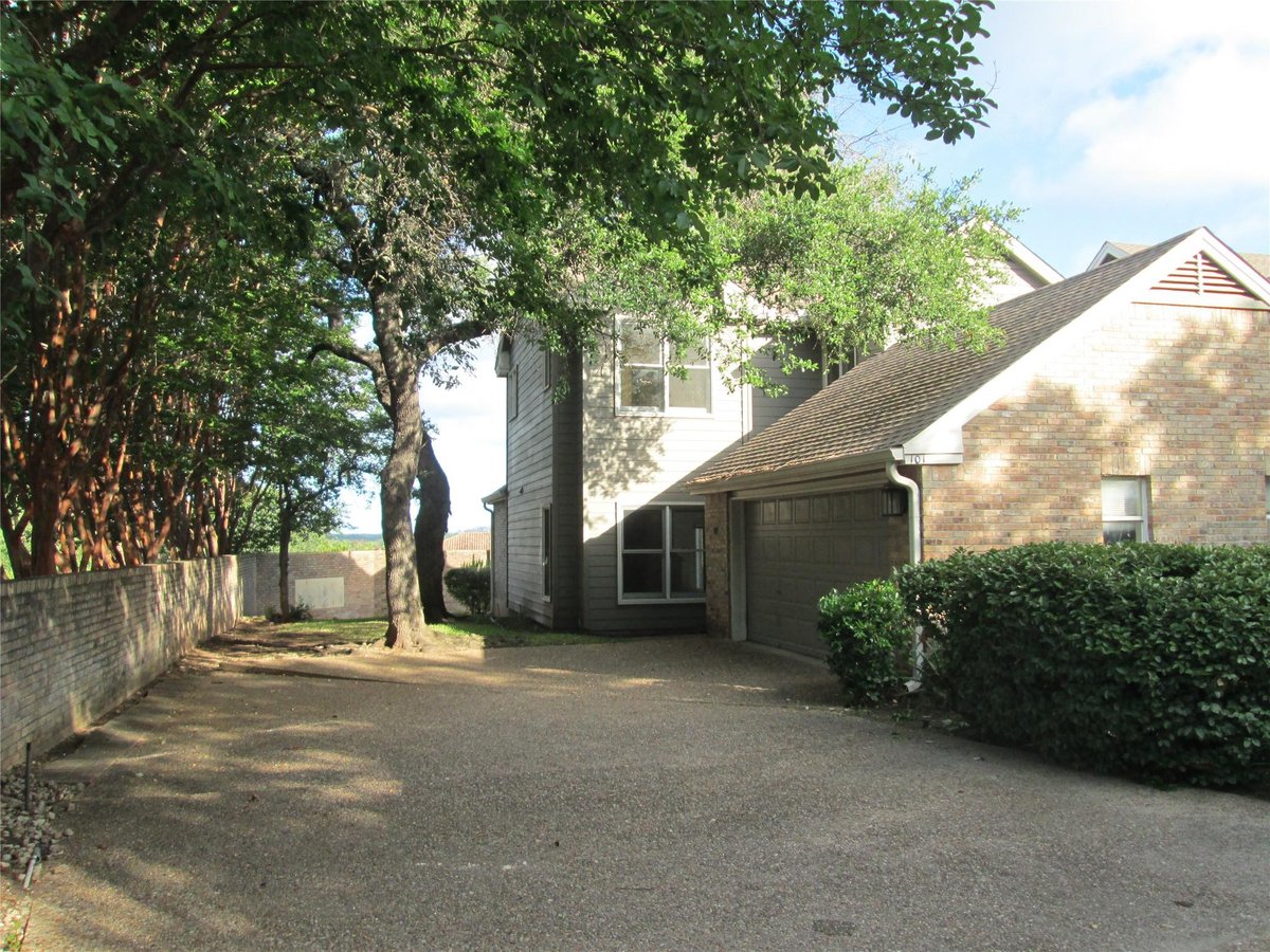 View 6010 Long Champ CT Unit #101 in Winners Circle 6010 Long Champ CT Unit #101 - property photo 1 - Luxury home in Winners Circle, Austin, TX