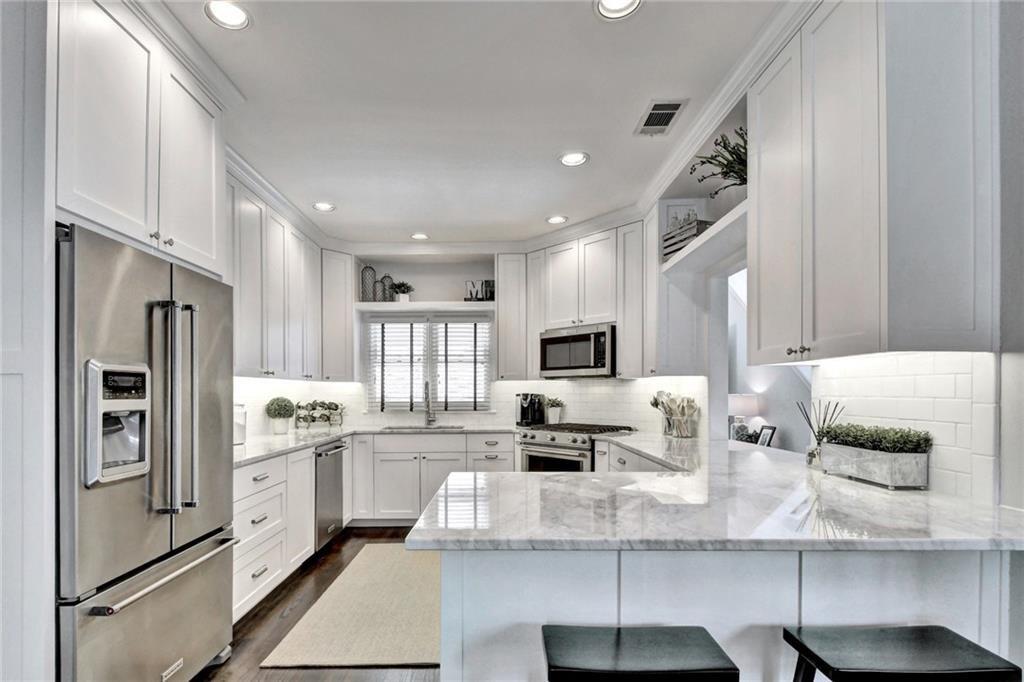 View 6010 Long Champ CT Unit #104 in Winners Circle 6010 Long Champ CT Unit #104 - property photo 1 - Luxury home in Winners Circle, Austin, TX