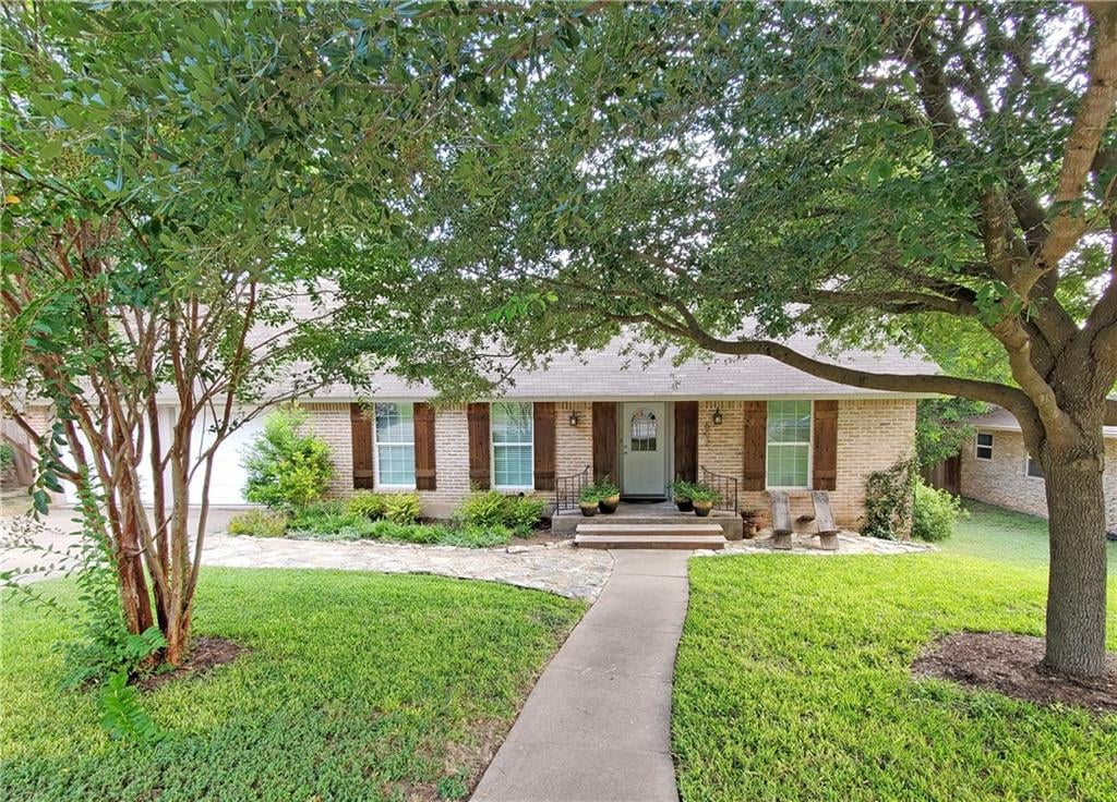 View 602 Little Oak Dr in Oak Ridge Sec 01 602 Little Oak Dr - front exterior - Luxury home in Oak Ridge Sec 01, Austin, TX