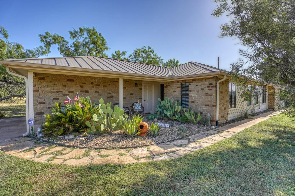 View 603 Sun Ray in Horseshoe Bay West 603 Sun Ray - front exterior - Luxury home in Horseshoe Bay West, Horseshoe Bay, TX