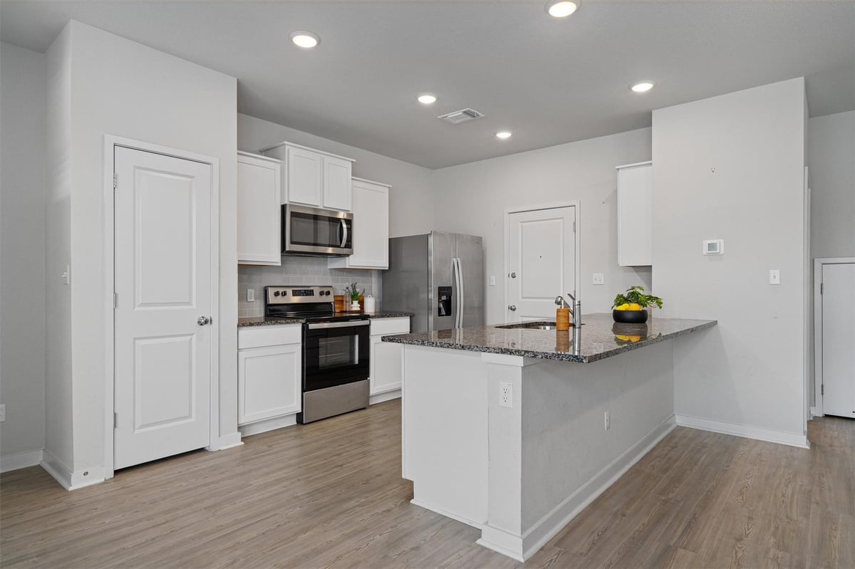 Primary bedroom at 605 W South St Unit #32 - 6 bed 4 bath home