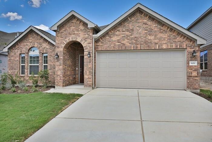 View 606 Linares Ln in Enclave At Estancia Condominiu 606 Linares Ln - front exterior - Luxury home in Enclave At Estancia Condominiu, Austin, TX