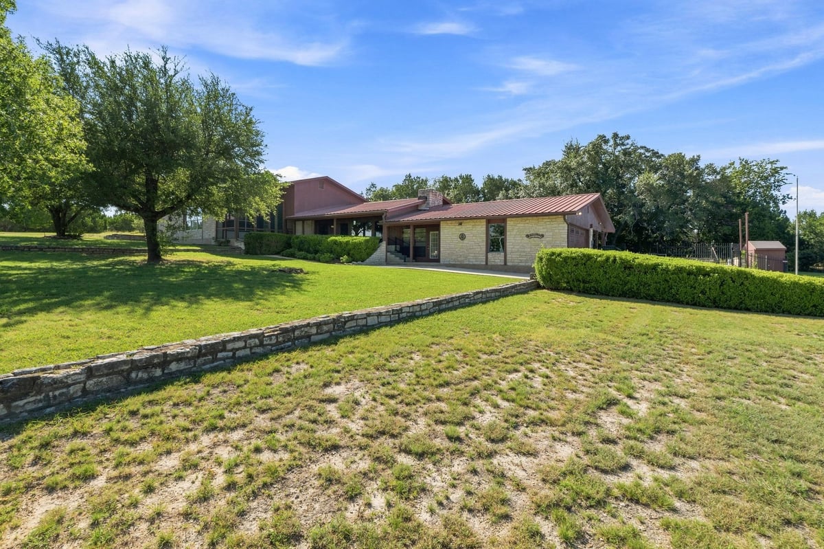 View 606 Rolling Hills RD in Rolling Hills Liberty Hill 606 Rolling Hills RD - front exterior - Luxury home in Rolling Hills Liberty Hill, Liberty Hill, TX