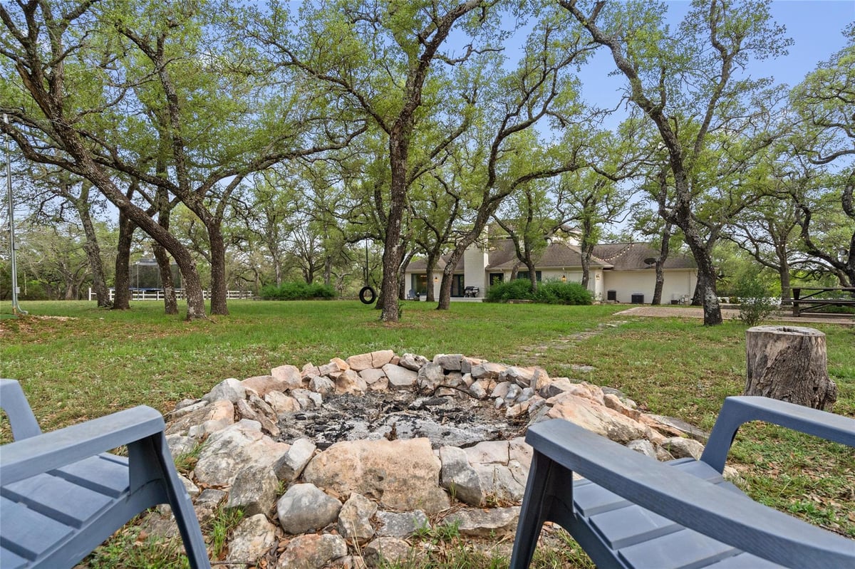 View 606 Winchester DR in Saddletree Ranch 606 Winchester DR - front exterior - Luxury home in Saddletree Ranch, Dripping Springs, TX