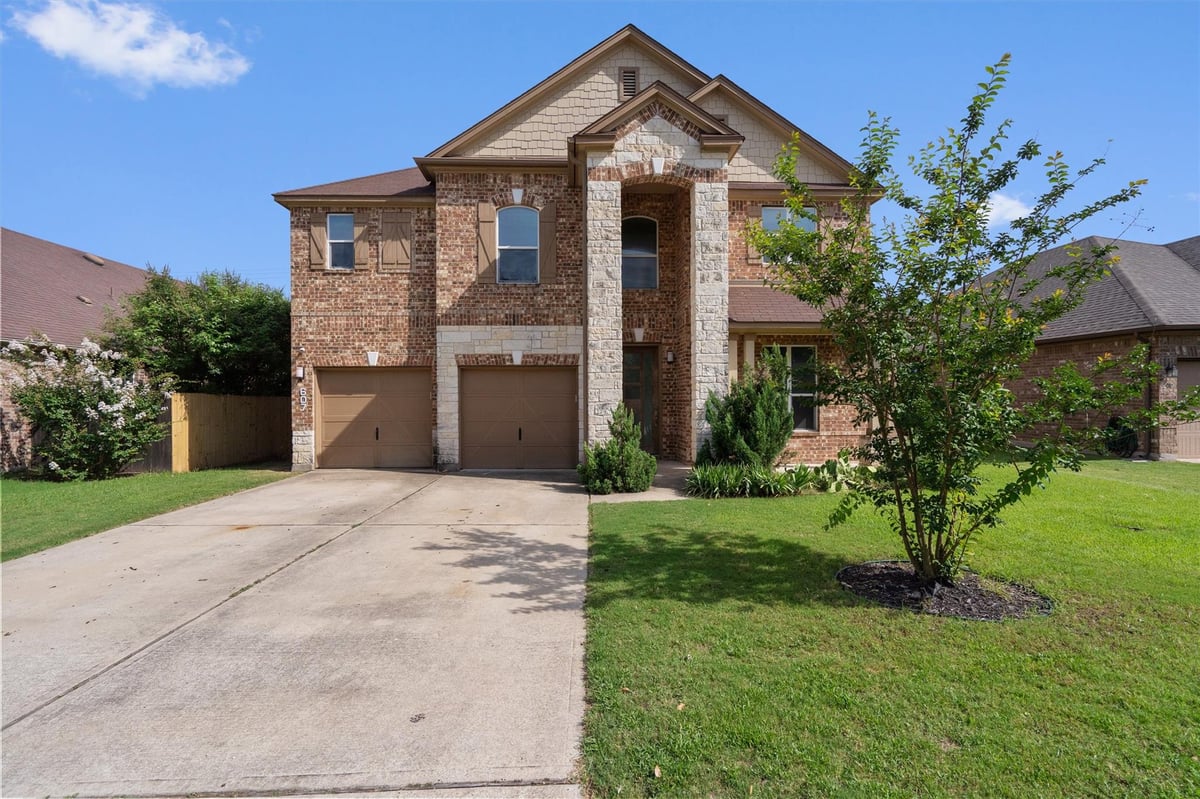 607 Yosemite TRL - front exterior - Luxury home in North Park Ph 1, Taylor, TX