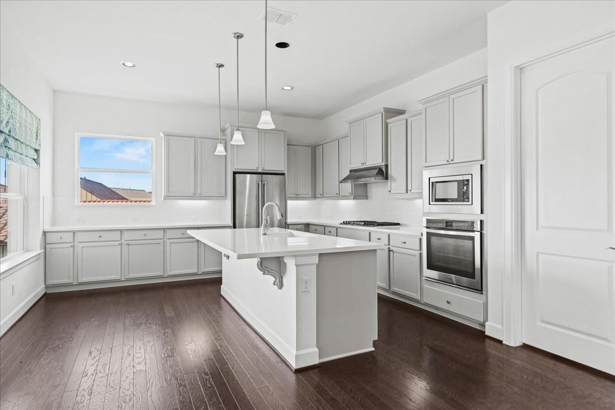 Kitchen at 609 Dancing Oak Ln - 3 bed 3 bath home
