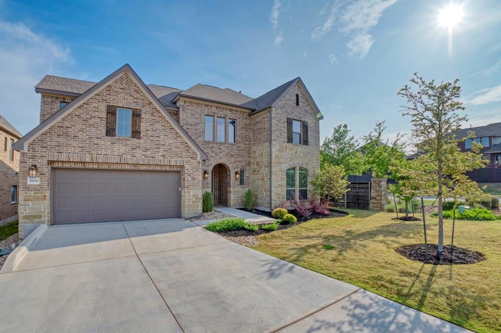 6100 Llano Stage Trl - front exterior - Luxury home in Sweetwater Ranch Sec 1 Village, Austin, TX