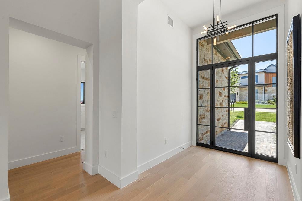 Primary bedroom at 6101 Adhara Pass - 5 bed 5 bath home
