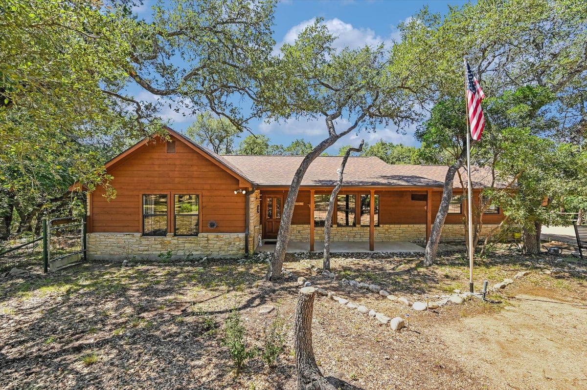 View 611 Mountain Crest Dr in Mountain Crest Unit 1 611 Mountain Crest Dr - front exterior - Luxury home in Mountain Crest Unit 1, Wimberley, TX