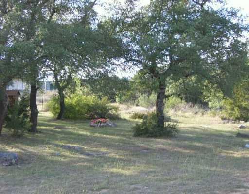 View 611 Newport DR 611 Newport DR - front exterior - Luxury lot in Spicewood, TX