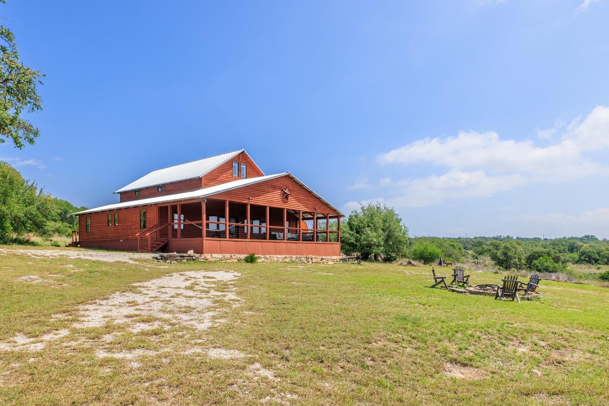 View 611 Weddle Rd in Pedernales Ranch Estates 611 Weddle Rd - front exterior - Luxury home in Pedernales Ranch Estates, Johnson City, TX