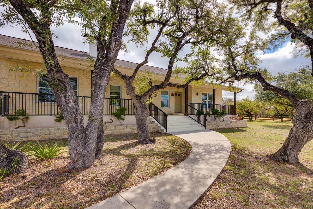 View 613 Canyon Rim Dr in Sunset Canyon Sec V 613 Canyon Rim Dr - property photo 1 - Luxury home in Sunset Canyon Sec V, Dripping Springs, TX
