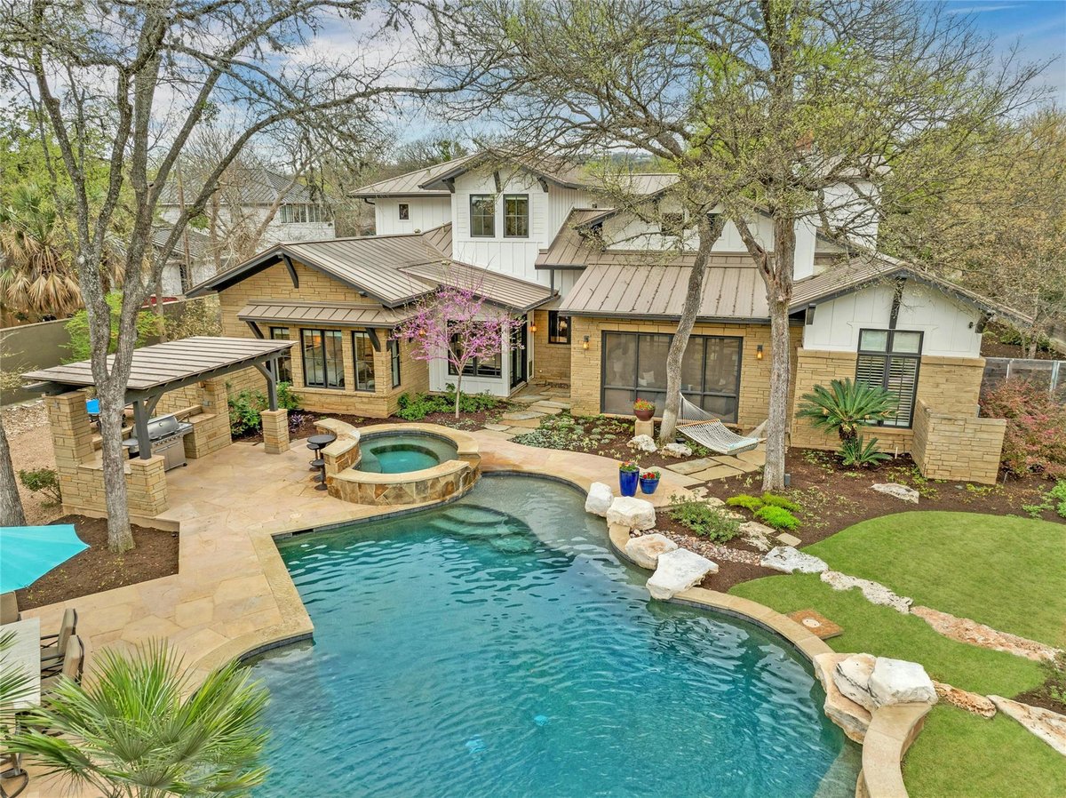 View 613 Rocky River RD in Sparks W 613 Rocky River RD - front exterior - Luxury home in Sparks W, West Lake Hills, TX