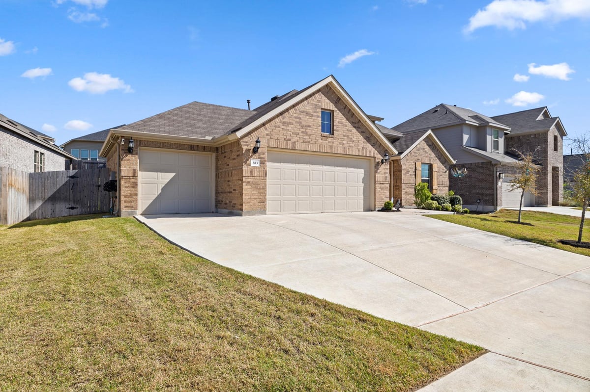 View 613 Sugar Cane RD in Sunfield Ph Five Sec Four 613 Sugar Cane RD - front exterior - Luxury home in Sunfield Ph Five Sec Four, Buda, TX