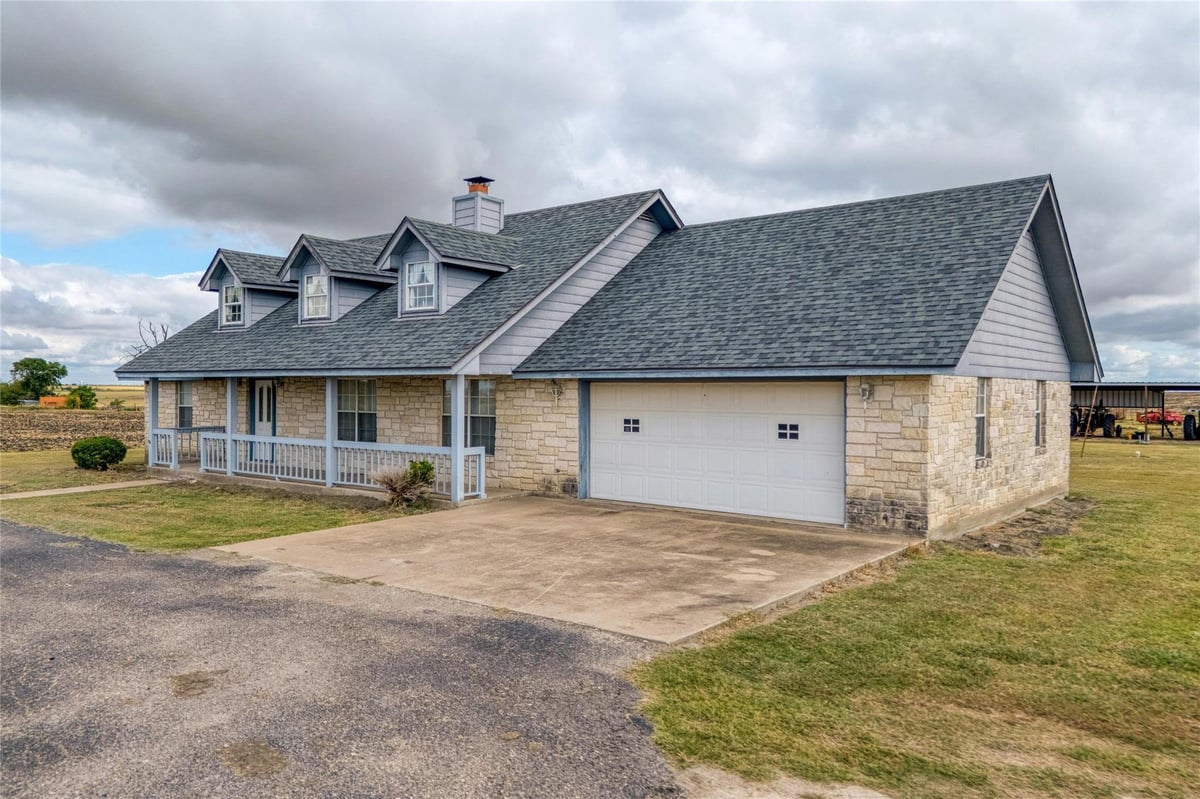View 615 County Road 357 in DEGRAFFENRIED 615 County Road 357 - front exterior - Luxury home in DEGRAFFENRIED, Granger, TX