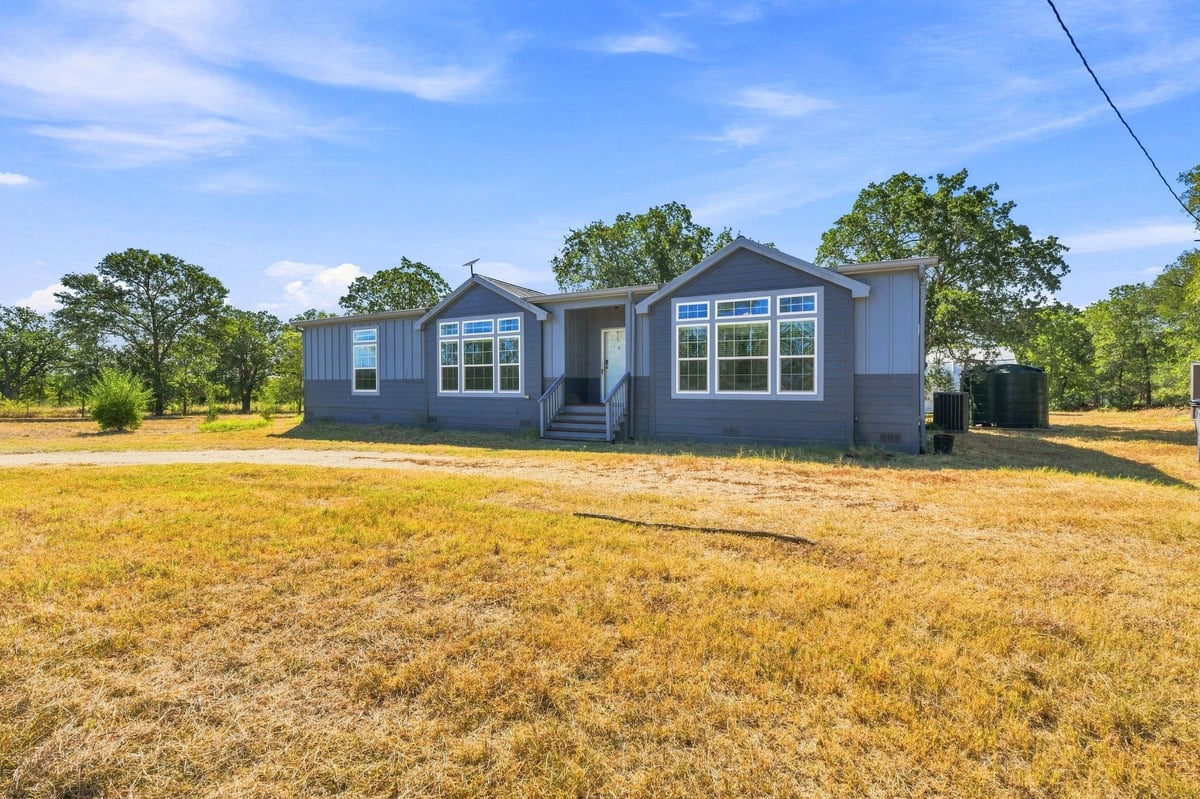 View 615 Green Acre DR in none 615 Green Acre DR - property photo 1 - Luxury home in none, Dale, TX