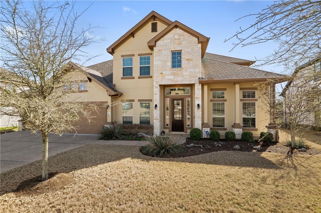 View 618 Emma Loop in Reunion Ranch 618 Emma Loop - front exterior - Luxury home in Reunion Ranch, Austin, TX