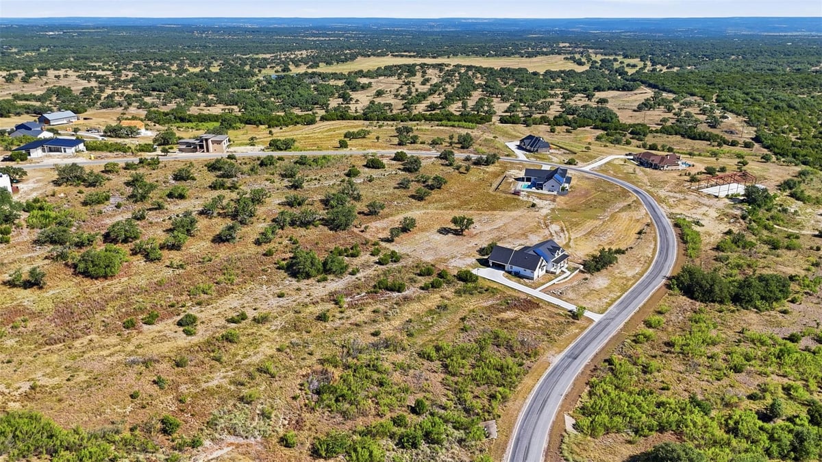 View 621 Bosque TRL in Summit Spgs 621 Bosque TRL - property photo 1 - Luxury lot in Summit Spgs, Marble Falls, TX