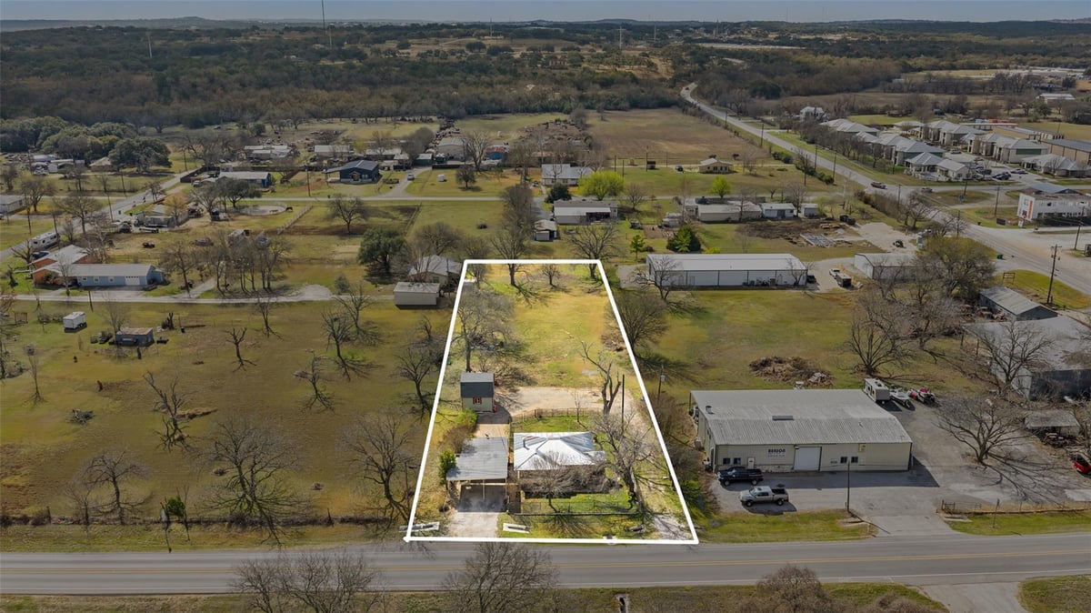 View 625 Ranch Road 165 in Pittsburg 625 Ranch Road 165 - front exterior - Luxury home in Pittsburg, Blanco, TX