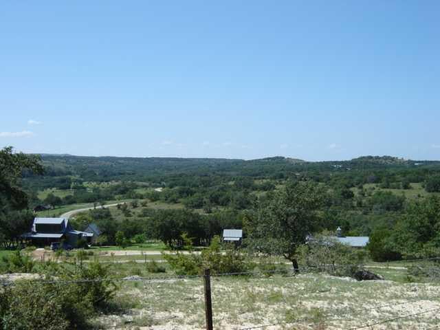 View 627 Ranch View RD 627 Ranch View RD - front exterior - Luxury home in Spicewood, TX