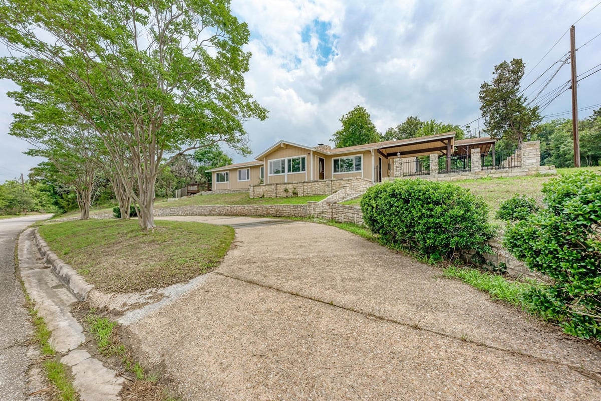 View 6301 Forest Hills DR in Knollwood 6301 Forest Hills DR - property photo 1 - Luxury home in Knollwood, Austin, TX