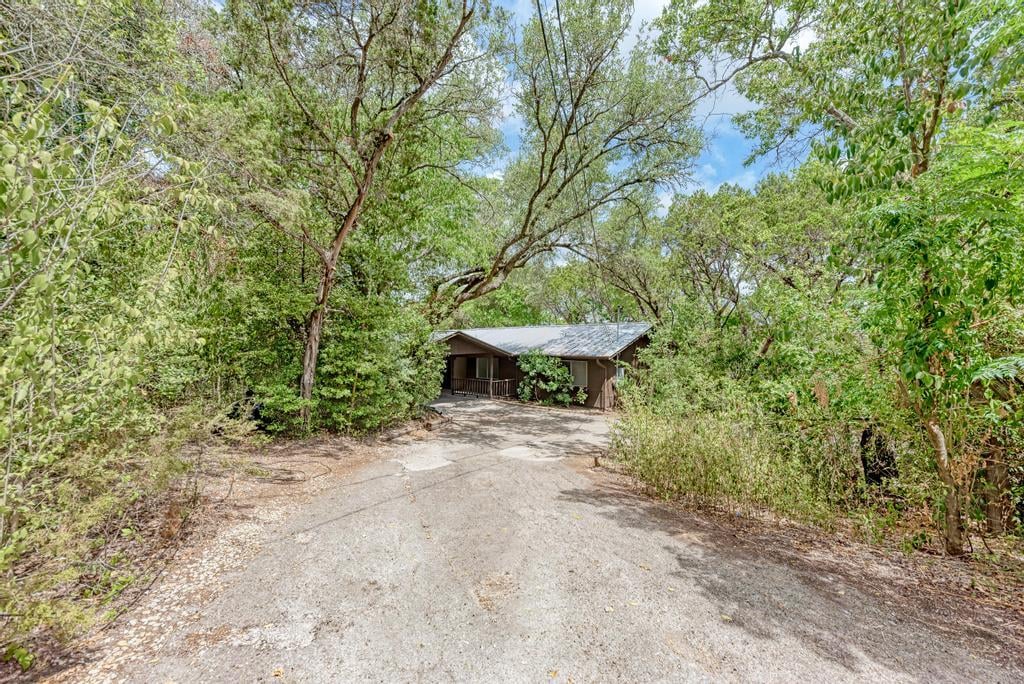 View 6305 Forest Hills DR in Knollwood 6305 Forest Hills DR - property photo 1 - Luxury home in Knollwood, Austin, TX