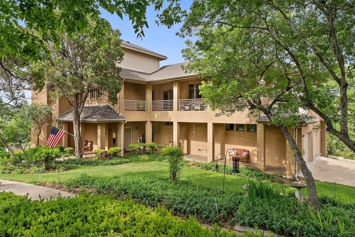6309 Northgrove RD - front exterior with multi-level exterior and wooded lot - Luxury home in Overlook At Cat Mountain Sec...