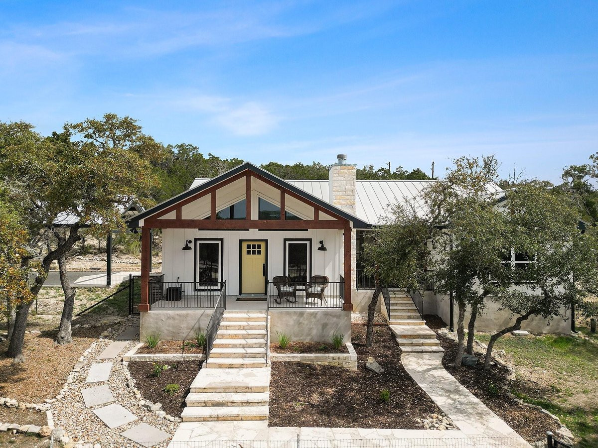 View 631 Lakeside Dr in Hill Country Ranches 631 Lakeside Dr - front exterior - Luxury home in Hill Country Ranches, Wimberley, TX