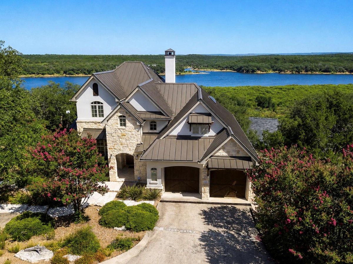 View 633 Wesley Ridge DR in The Point At Ridge Harbor 633 Wesley Ridge DR - front exterior - Luxury home in The Point At Ridge Harbor, Spicewood, TX