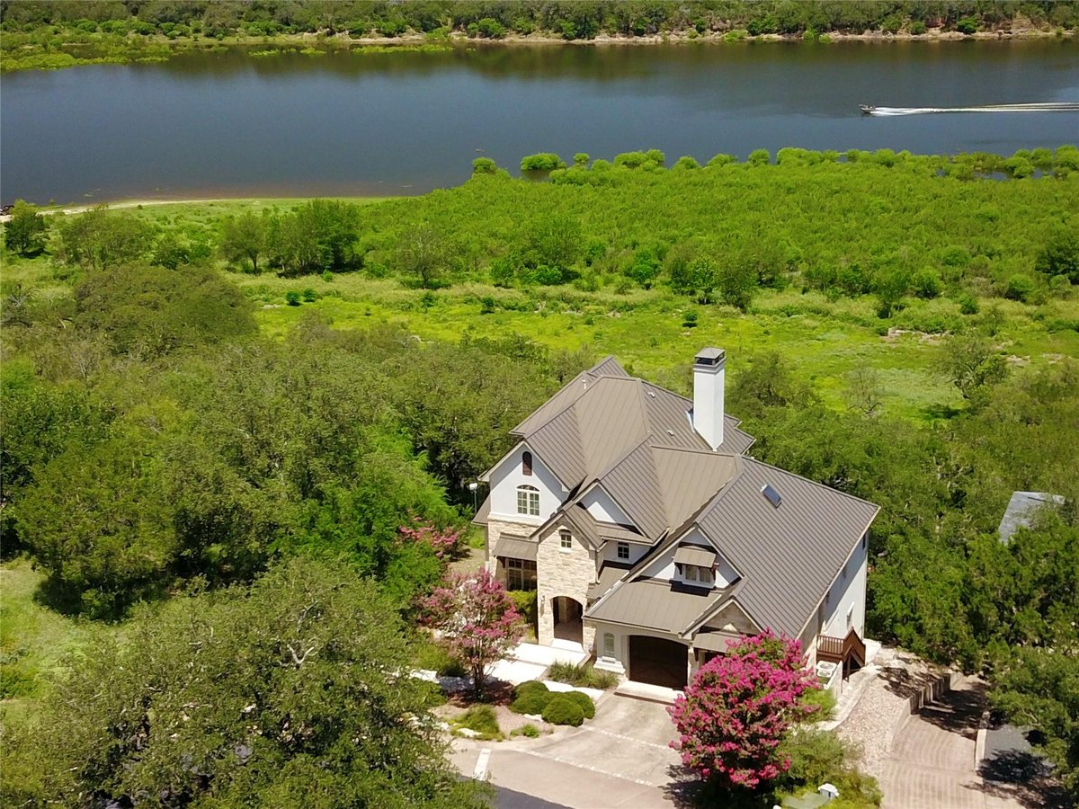 633 Wesley Ridge Dr - front exterior - Luxury home in The Point At Ridge Harbor, Spicewood, TX