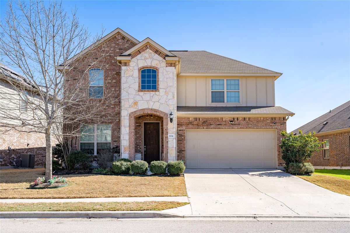View 634 Blossom Valley Strm in The Meadows At Buda Ph Four-B 634 Blossom Valley Strm - front exterior - Luxury home in The Meadows At Buda Ph Four-B, Buda, TX