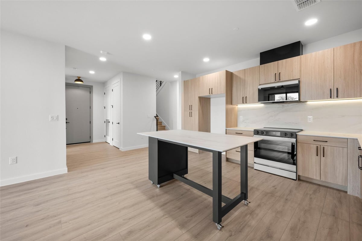 Living area at 634 Central Pkwy Unit #1211 - 3 bed 3 bath home