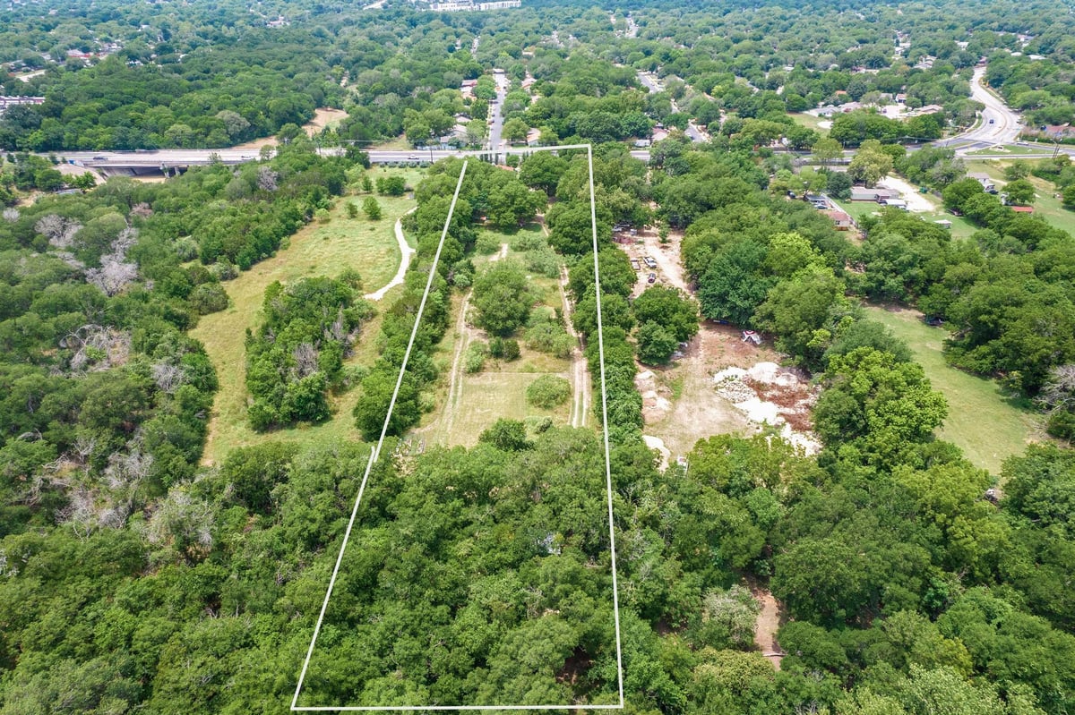 View 6405 S Pleasant Valley Rd in Santiago Del Valle Grant Abs # 6405 S Pleasant Valley Rd - front exterior - Luxury lot in Santiago Del Valle Grant Abs #, Austin, TX