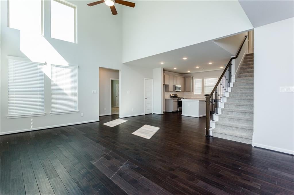 Primary bedroom at 6407 Rounded Pebble Ln - 5 bed 3 bath home