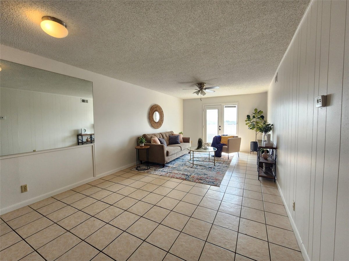 Living area at 6501 E Hill Dr Unit #121 - 3 bed 2 bath home