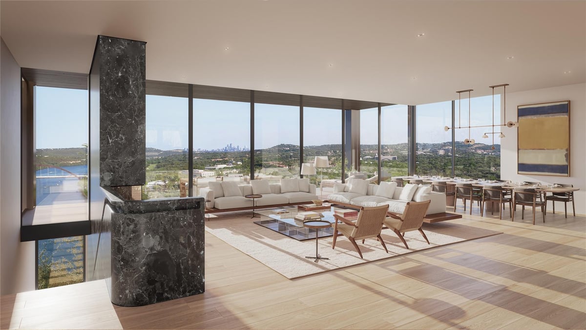 Living area with floor-to-ceiling windows at 6507  Bridge Point Pkwy  #Lot 4 - 4 bed 4 bath home