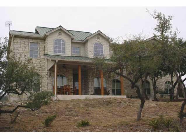 View 651 Myers Creek RD 651 Myers Creek RD - front exterior - Luxury home in Dripping Springs, TX