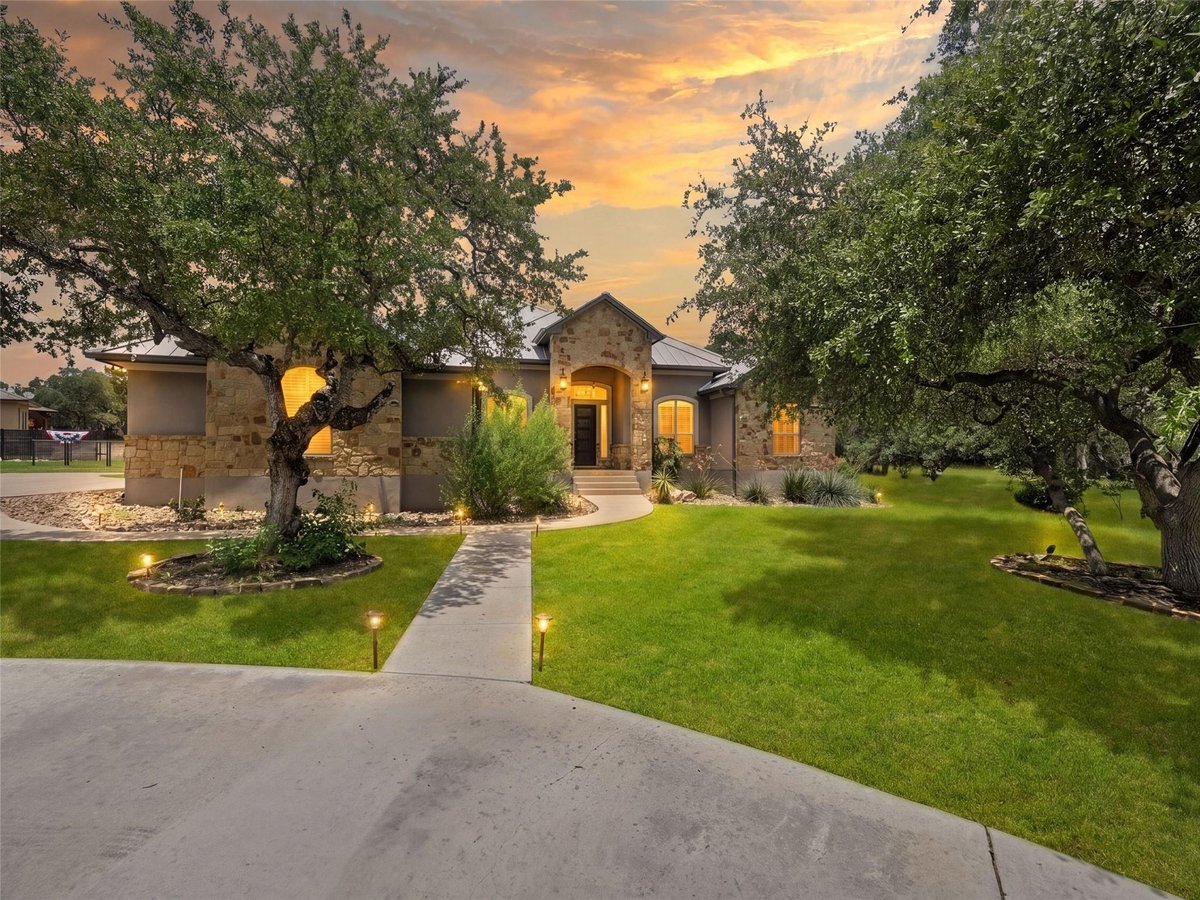 View 654 Copper TRCE in Copper Ridge Ph 4 654 Copper TRCE - front exterior - Luxury home in Copper Ridge Ph 4, New Braunfels, TX