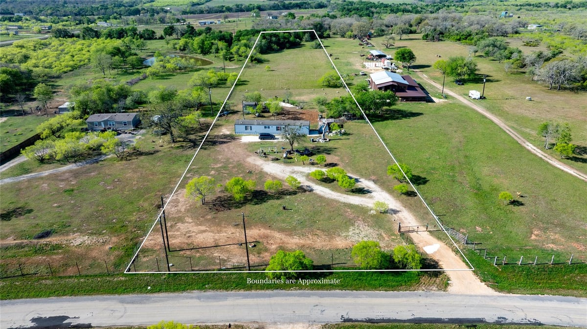 6575 Taylorsville RD - front exterior - Luxury home in Village Ranchettes, Dale, TX