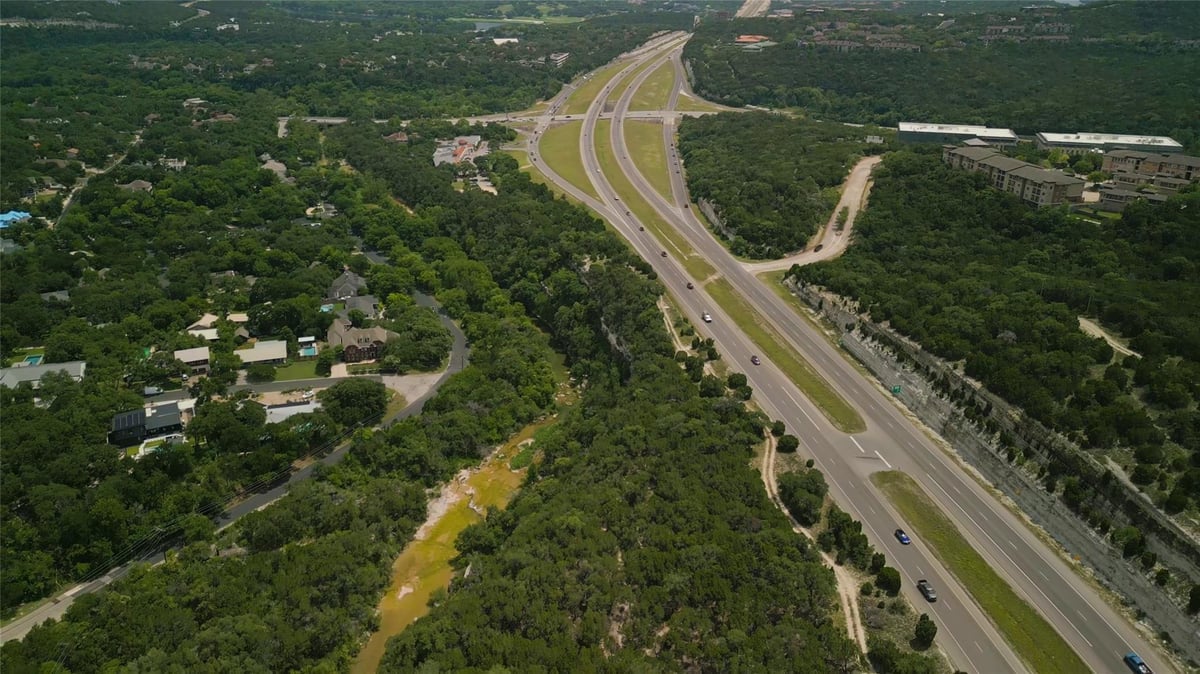 Primary bedroom at 6601 N Capital of Texas Hwy - Champion 360 Subd, Austin, TX