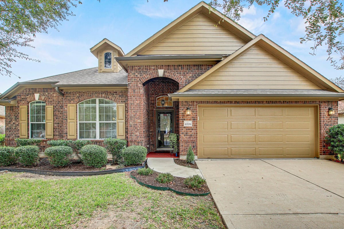 View 6709 Cromarty LN in Belhaven Sec 02 6709 Cromarty LN - front exterior - Luxury home in Belhaven Sec 02, Austin, TX
