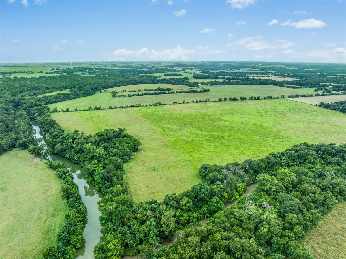 View 6731 E Fm 1123 in Summer's Mill 6731 E Fm 1123 - aerial view with large riverfront or creekfront ranch aer - Luxury home in Summer's Mill, Belton, TX