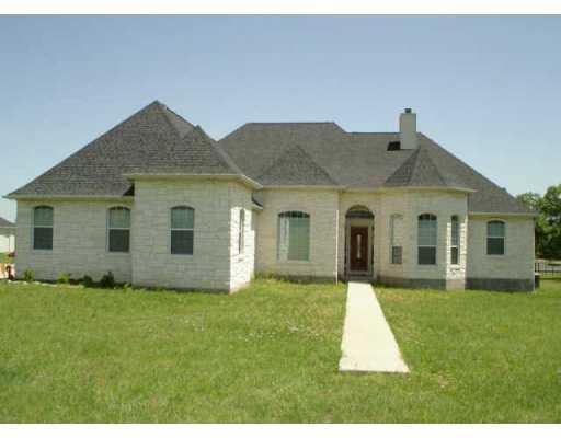 View 681 Highway 95 681 Highway 95 - front exterior - Luxury home in Smithville, TX
