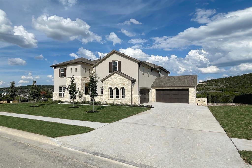 View 6817 Davenport Divide Rd in Sweetwater Ranch 6817 Davenport Divide Rd - front exterior - Luxury home in Sweetwater Ranch, Austin, TX