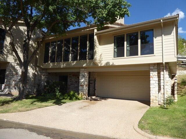 View 6820 Cypress PT Unit #34 in Woodslopes Lost Creek Condo Am 6820 Cypress PT Unit #34 - property photo 1 - Luxury home in Woodslopes Lost Creek Condo Am, Austin, TX