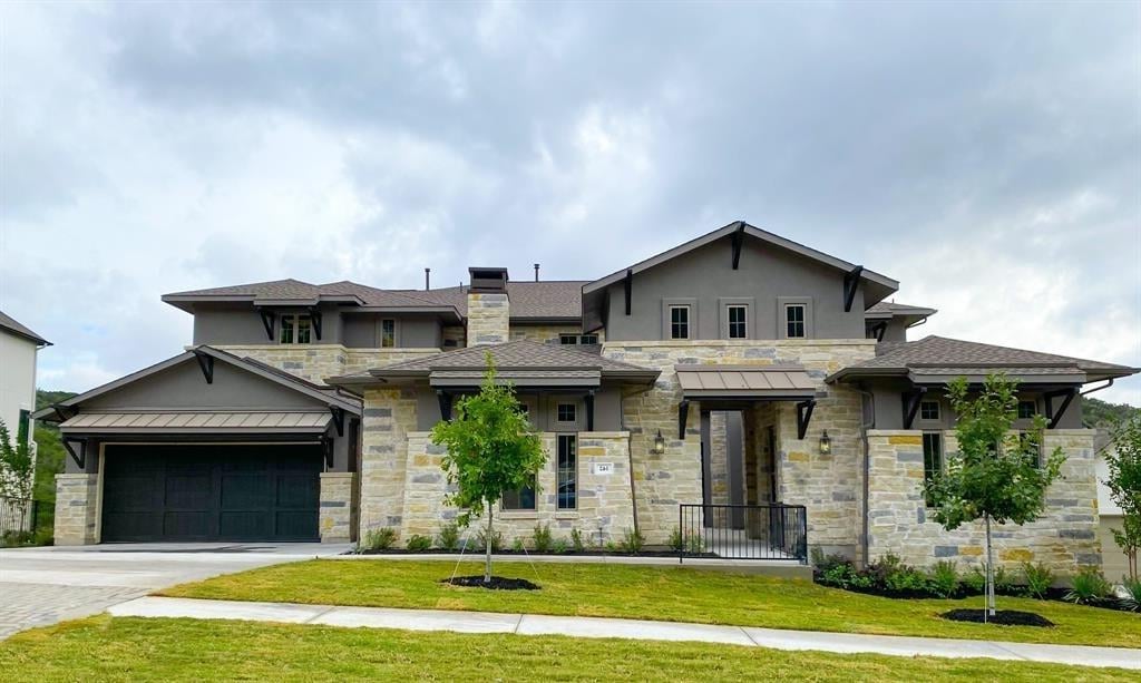 View 6824 Davenport Divide Rd in Sweetwater Ranch Sec 2 Village P3A 6824 Davenport Divide Rd - front exterior - Luxury home in Sweetwater Ranch Sec 2 Village P3A, Austin, TX