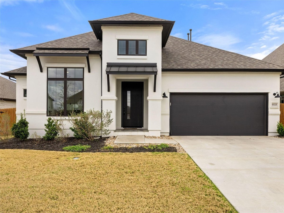 View 6825 Empresa DR in Sweetwater Ranch 6825 Empresa DR - front exterior - Luxury home in Sweetwater Ranch, Austin, TX