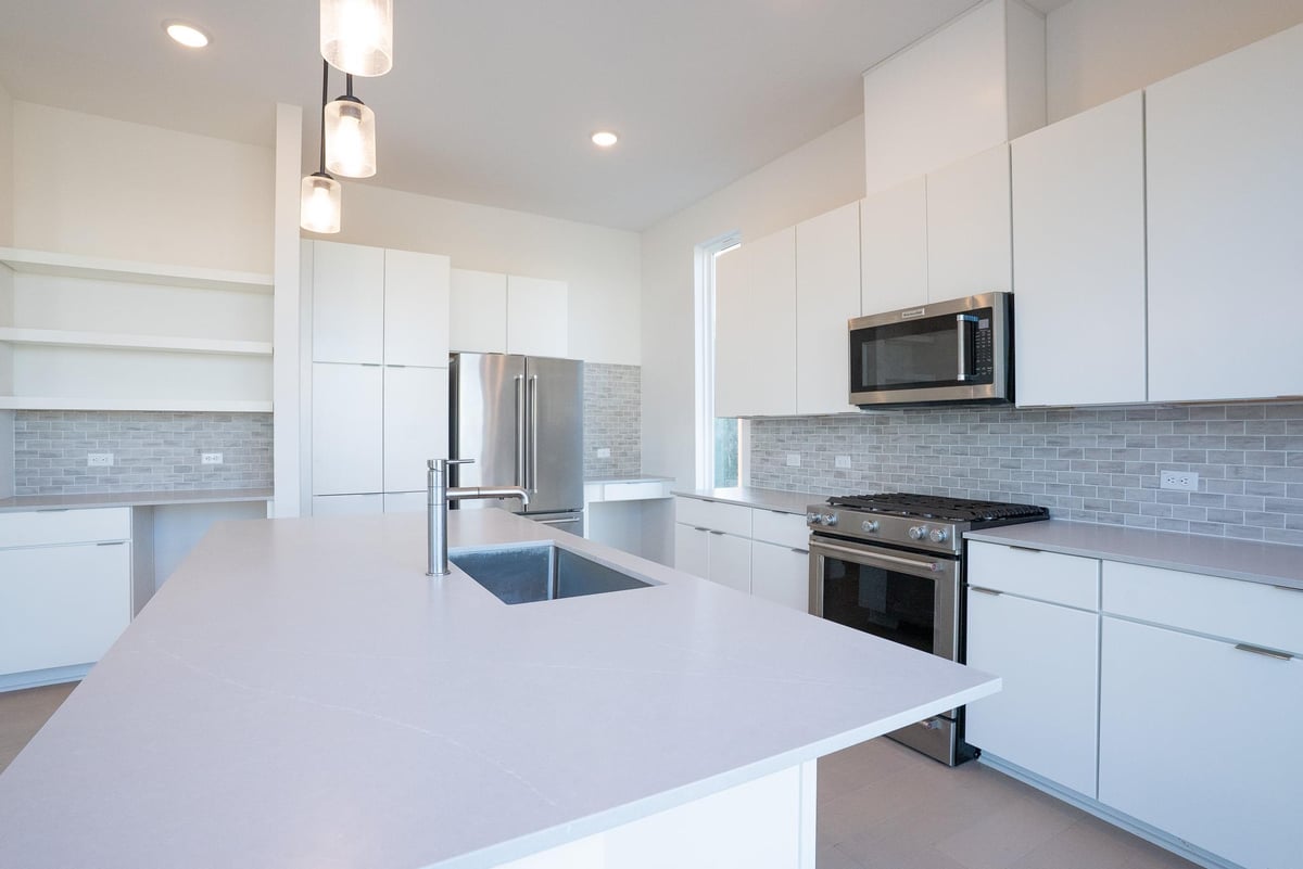 Kitchen at 6825 Wolfcreek Pass Unit #3 - 3 bed 3 bath home