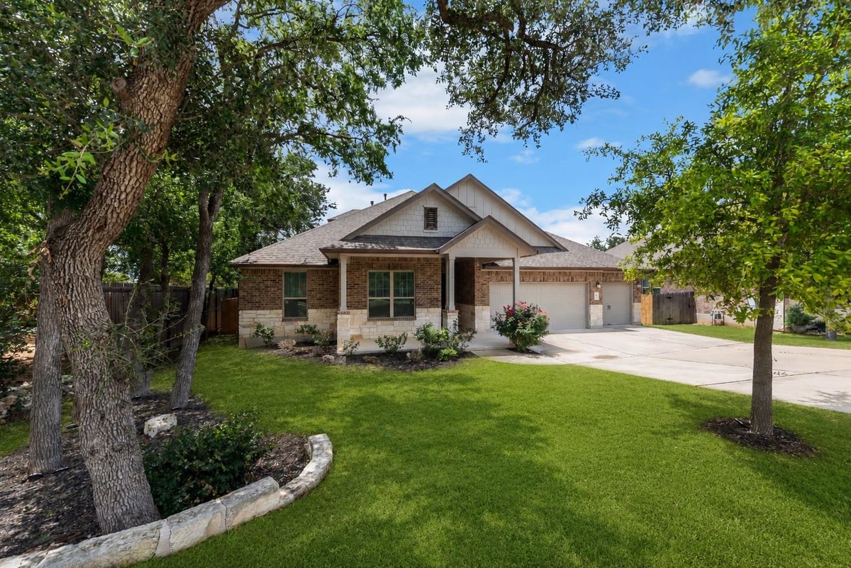View 689 Pink Granite BLVD in Arrowhead Ranch 689 Pink Granite BLVD - front exterior - Luxury home in Arrowhead Ranch, Dripping Springs, TX